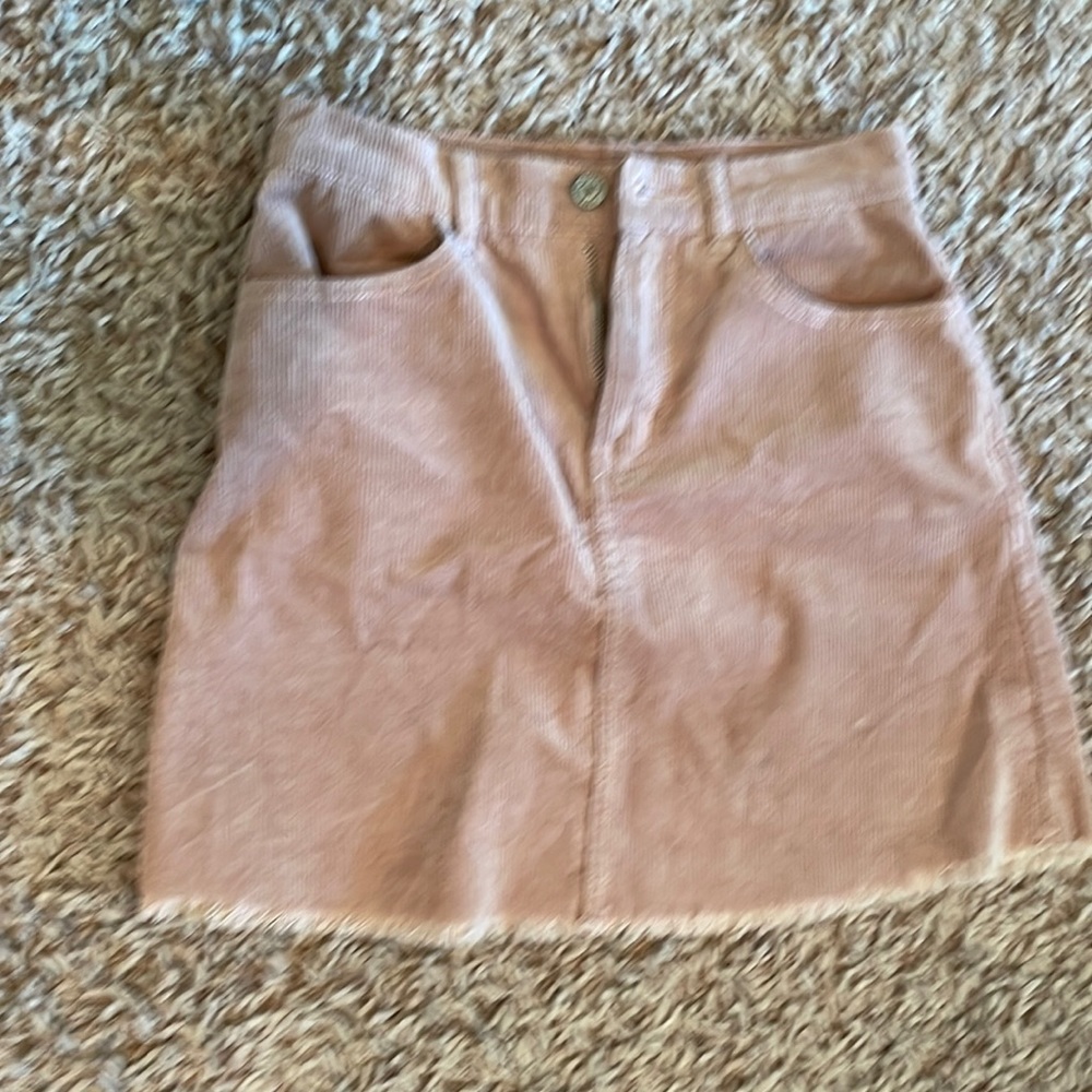 Pink corduroy brandy Melville skirt with raw hem